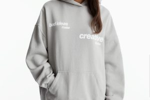 HOODIE WITH SLOGAN